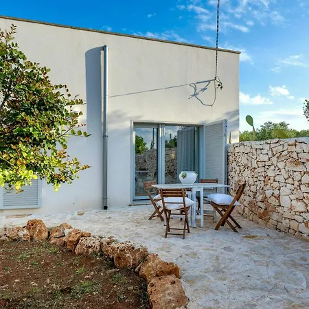 Stone Among Olive Trees Near 오스투니